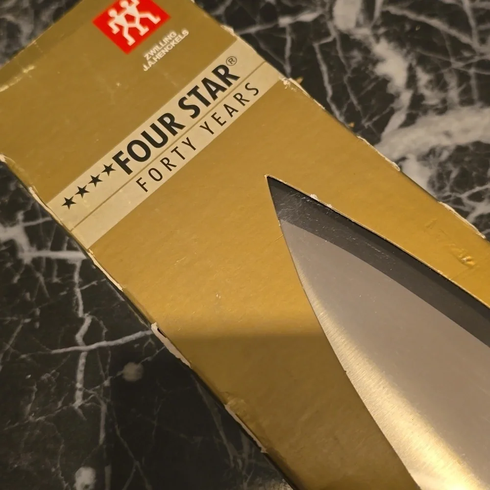 ❤️BUY 2 GET 1 FREE Zwilling Four Star 7 inch Chef's Knife, Retail Price $129.95